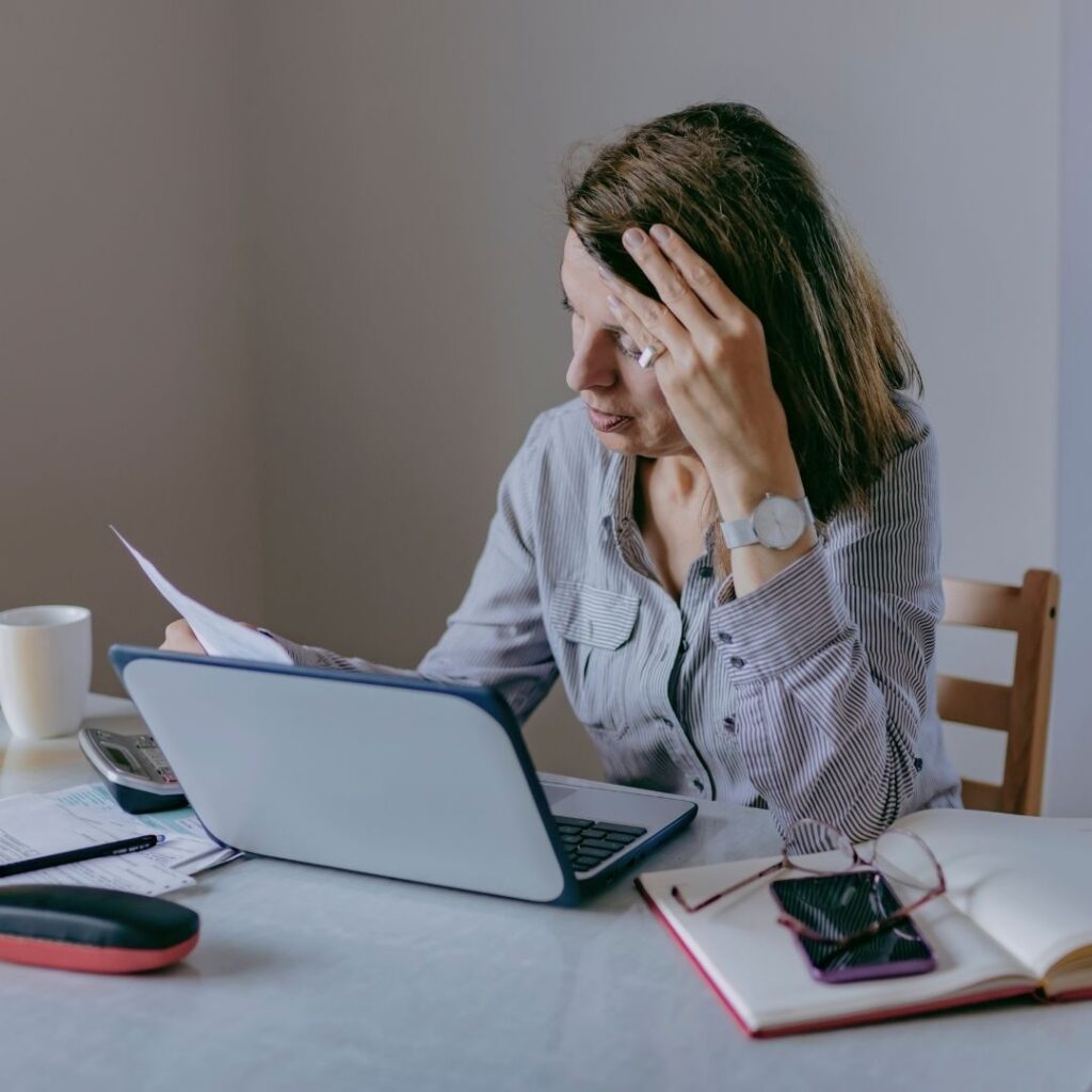 women looking at her laptop