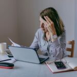 women looking at her laptop